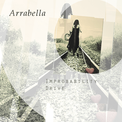 A gothic lady walking away from the camera on traintracks away to freedom