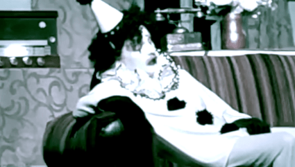 A melancholic Pagliacci drifts through an upside-down dream world